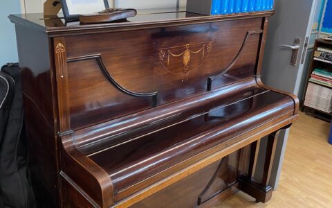 Piano and historical musical items gifted to Walton Academy